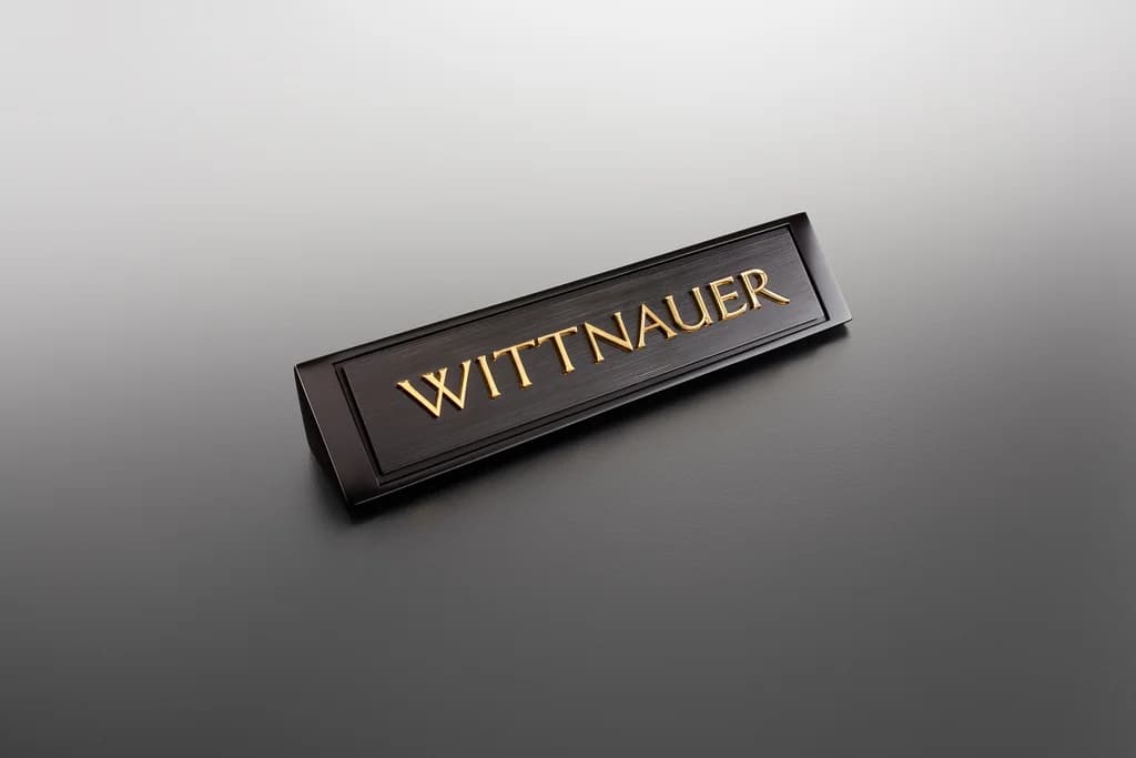 Wittnauer: Counter nameplate sign produced by Casadevall Group.