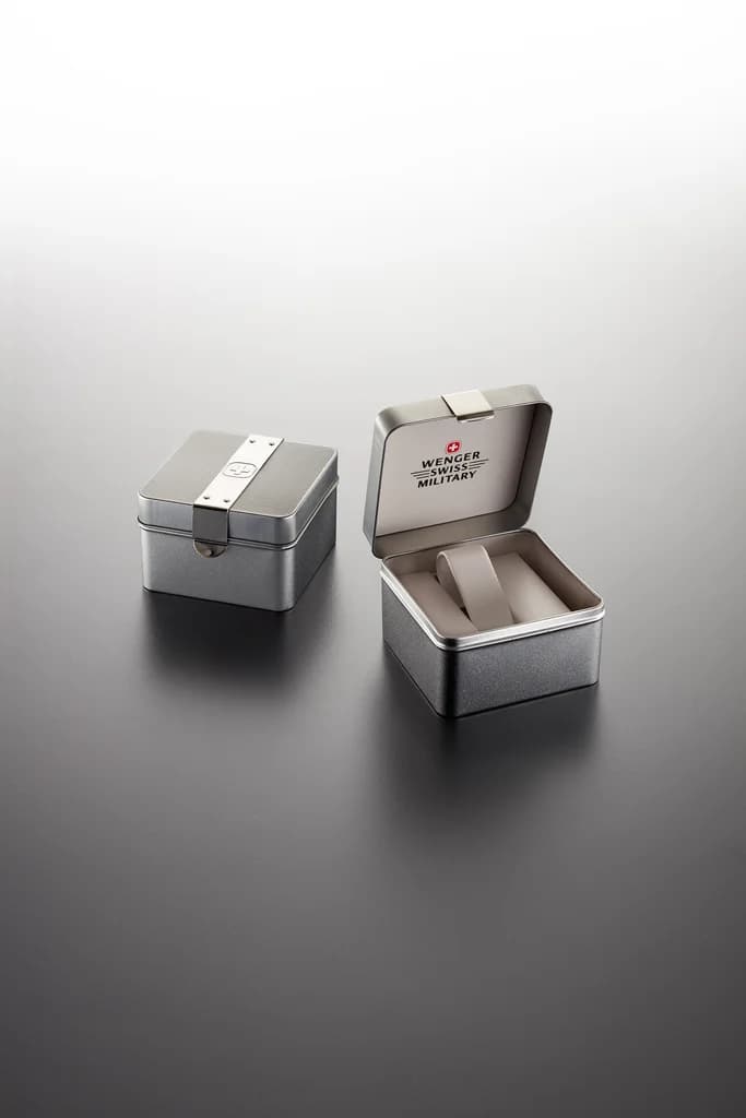 Wegner Swiss: Metal tin watch case produced by Casadevall Group.