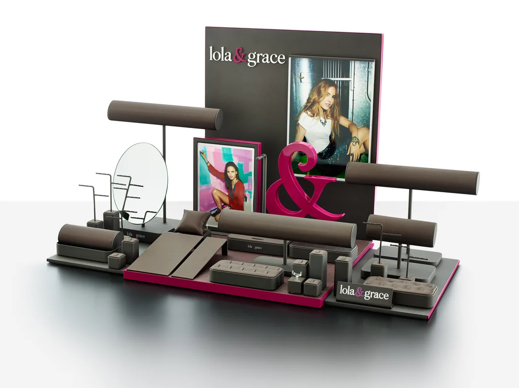 Lola & Grace: Taupe leather-wrapped display produced by Casadevall Group.