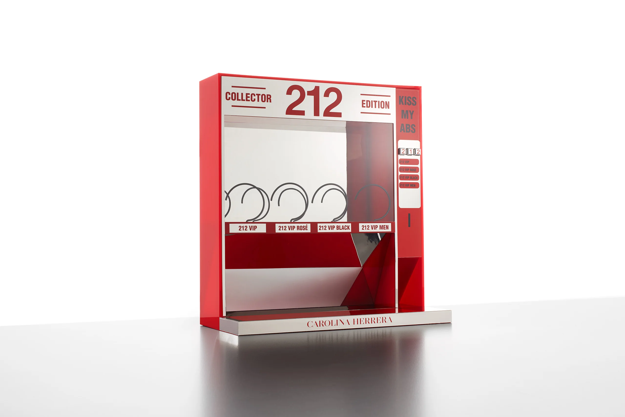 Carolina Herrera: Red-and-mirror countertop display produced by Casadevall Group.
